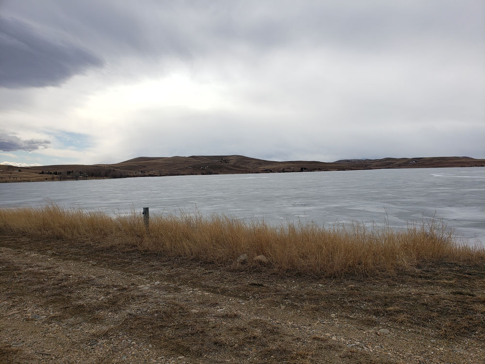 Cooney Dam, its source waters, spillway, and Rock Creek, in Carbon Co