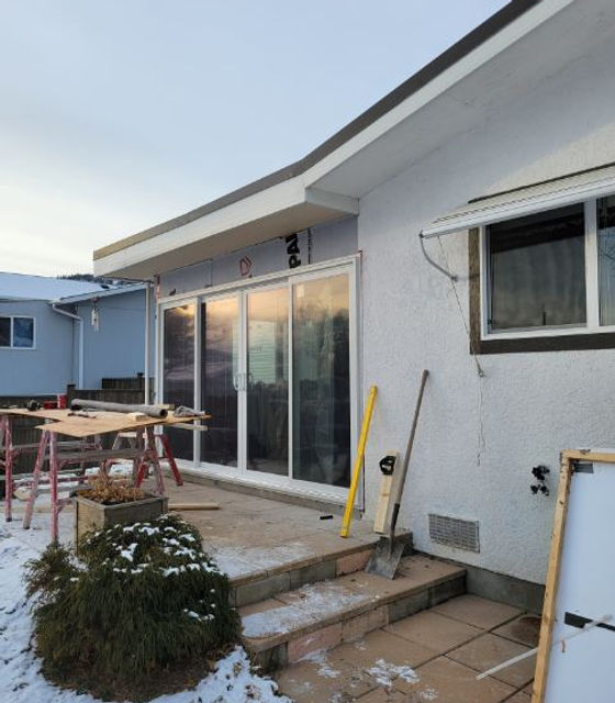 double opening patio door added to sunroom