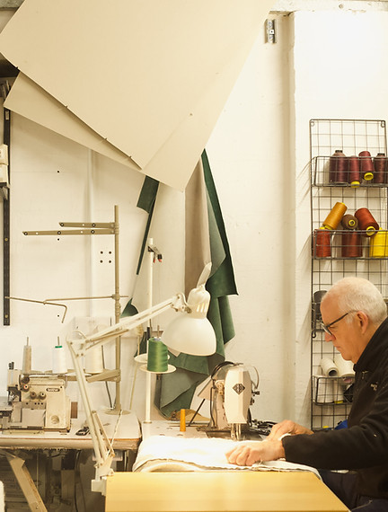 Mark sewing FR-free sofas. Style with purposeāour workshop showcases natural sofas and plastic free accessories that combine sustainability with beautiful design.