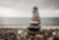 Stack of Pebbles on a Pebble Beach