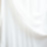 Faded image of draped white fabric.jpg