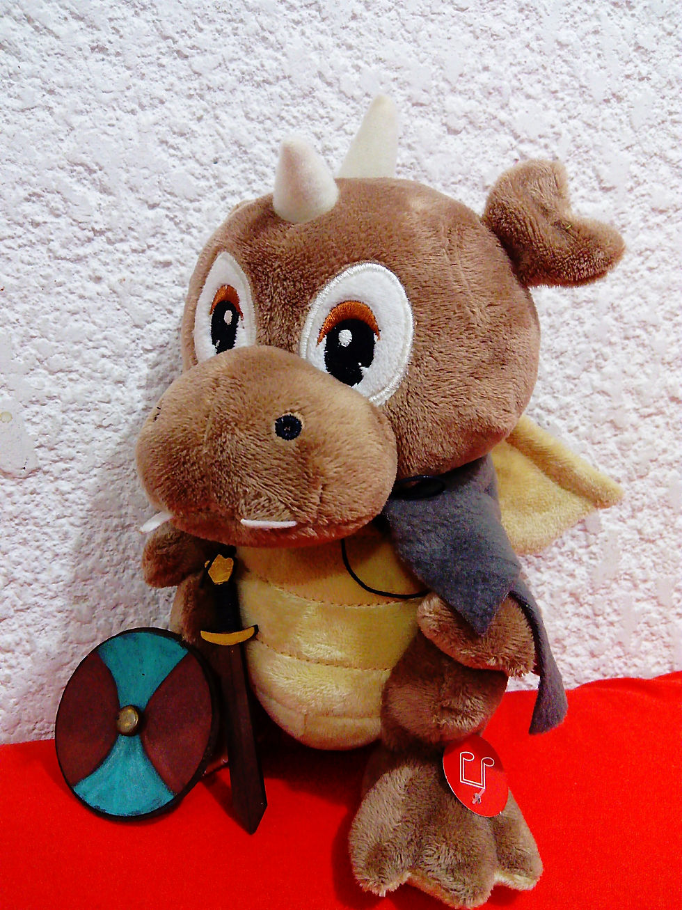Miniatura: Dragón de peluche con sonido