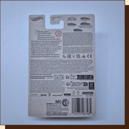 Thumbnail: A Hot Wheels card back with text and barcodes on a white background.