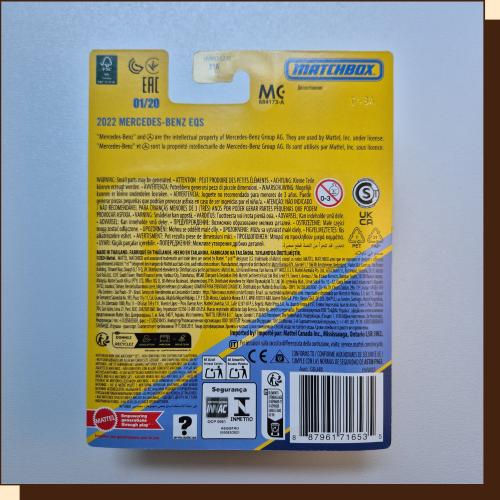 Thumbnail: Achterkant van Hot Wheels-verpakking met gele en blauwe details. Barcode en tekst.