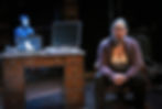 a man and a woman with a laptop computer