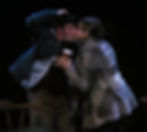 a man and woman kissing