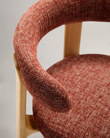Close-up of Wrenford Dining Chair with red textured fabric