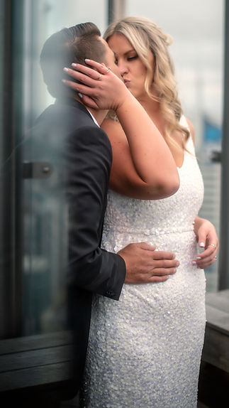 Bride and groom embracing softly