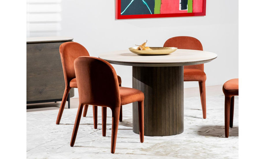 Hartwell Dining Chairs around a round stone table