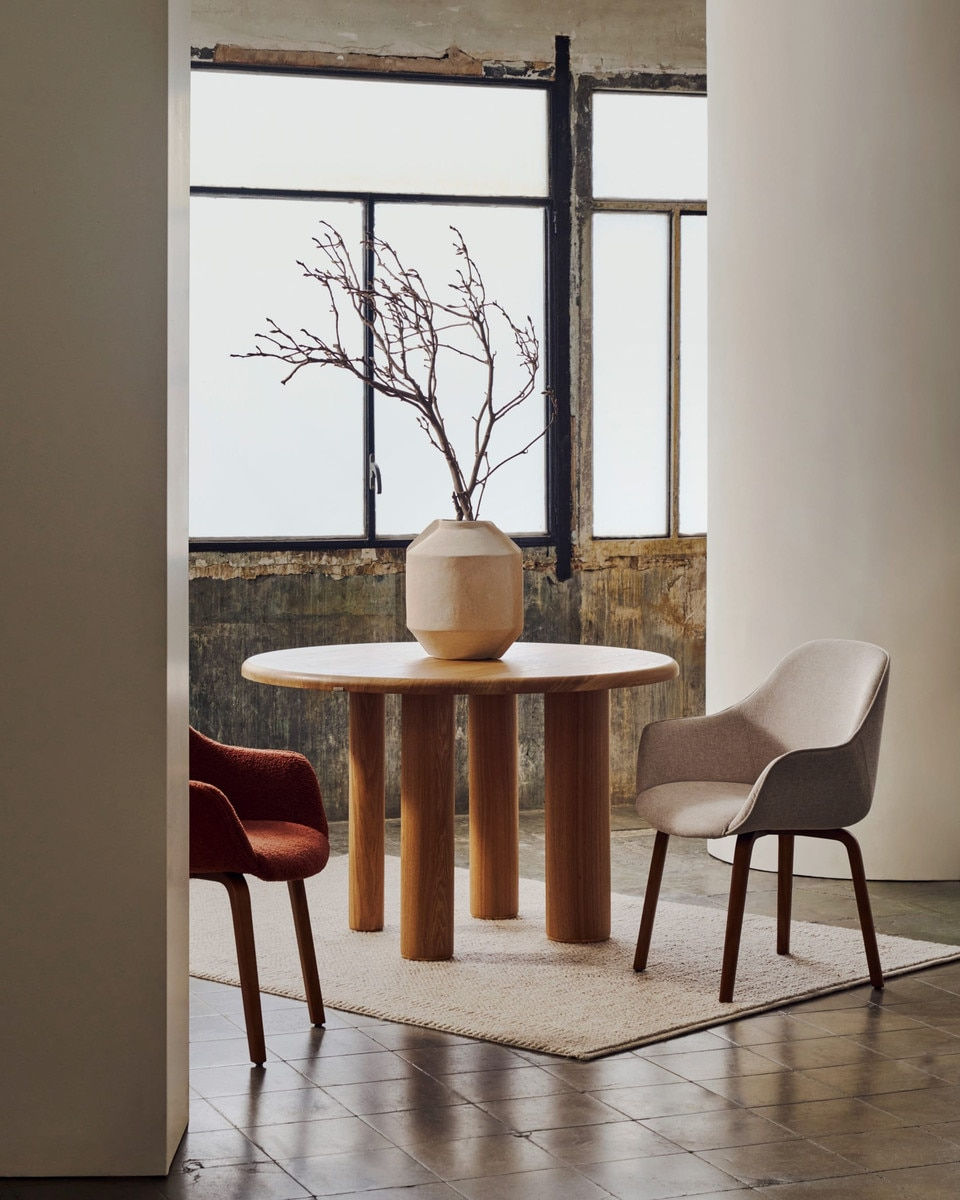 Oakhaven Round Dining Table 120 cm with two chairs.