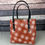 Thumbnail: Minimalist Orange Snowflake Bag