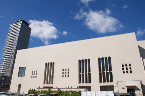 It is located in a residential area lined with high-rise apartment buildings.
