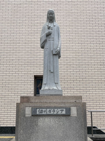 Statue of Hosokawa Gracia on the right side of the front of the church