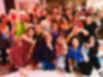 A large group of guests posing together at Relish in Singapore