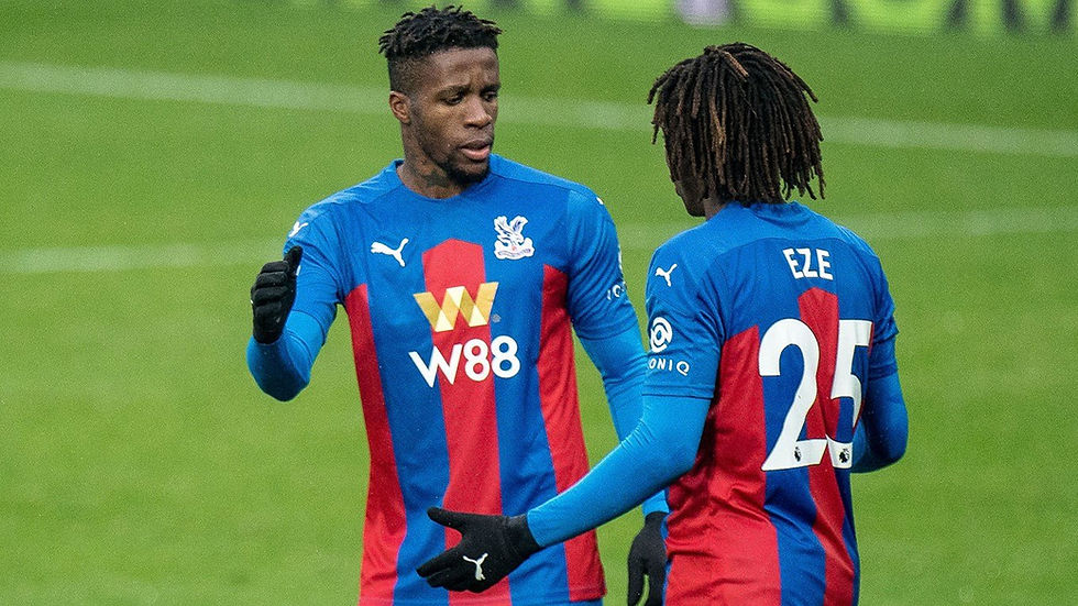 eze and zaha exchanging high-fives