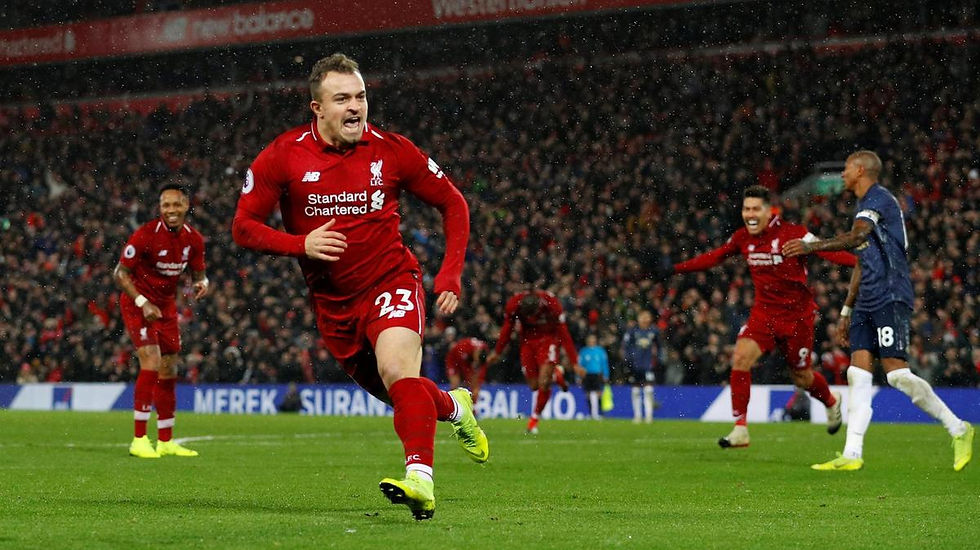 Shaqiri celebrating a goal against Manchester United