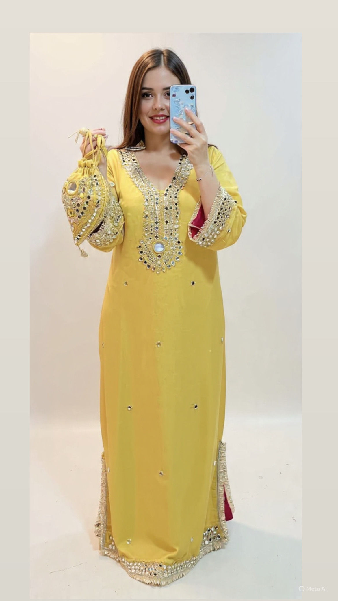 Yellow long dress with mirror embroidery & potli bag 