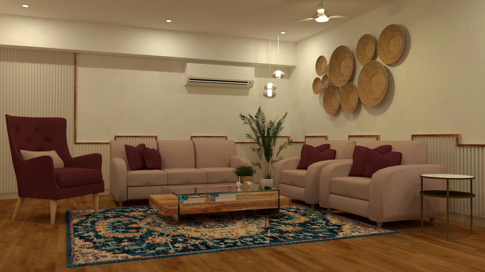 The living space embodies a harmonious blend of soft femininity and vintage elegance, utilizing a delicate baby pink color palette that beautifully complements the rich tones of an old plum king chair. By refurbishing the existing sofa and preserving the classic wall panels, the design emphasizes sophisticated nostalgia while ensuring a fresh, inviting atmosphere.