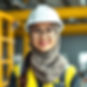 a young Asian female engineer in hijab and safety hat.jpg