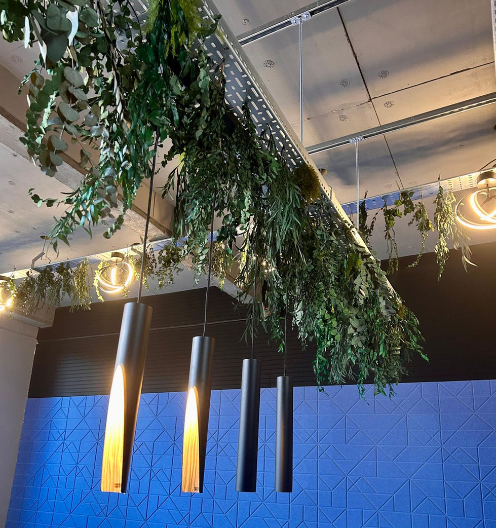 trailing green planting from cable trays