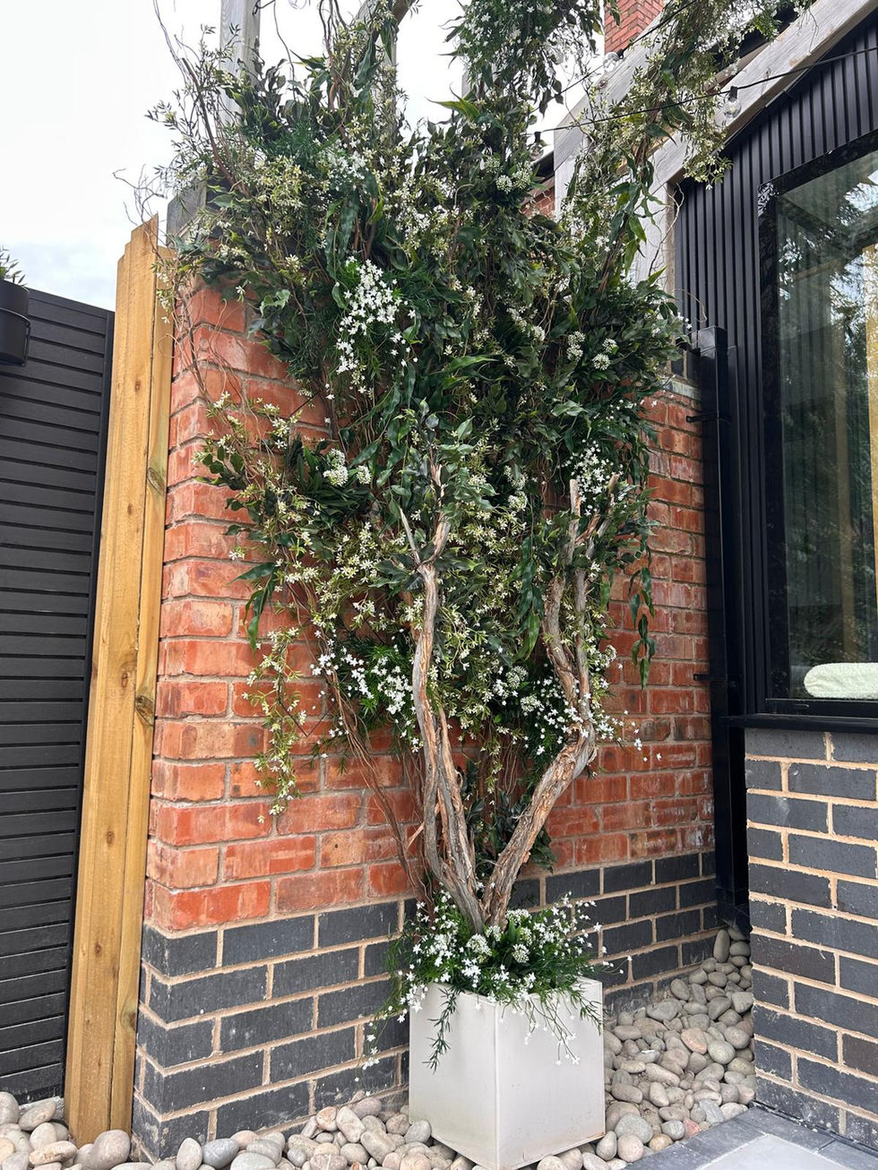 Outdoor artificial bespoke tree.