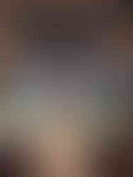 Very beautiful marble altar, statue and magnificent stained-glass windows in this church in Toulouse.