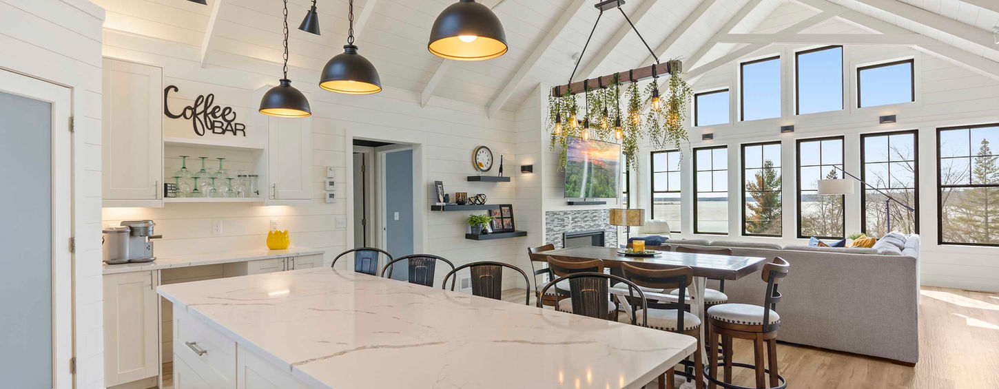 Large kitchen island with marble countertops