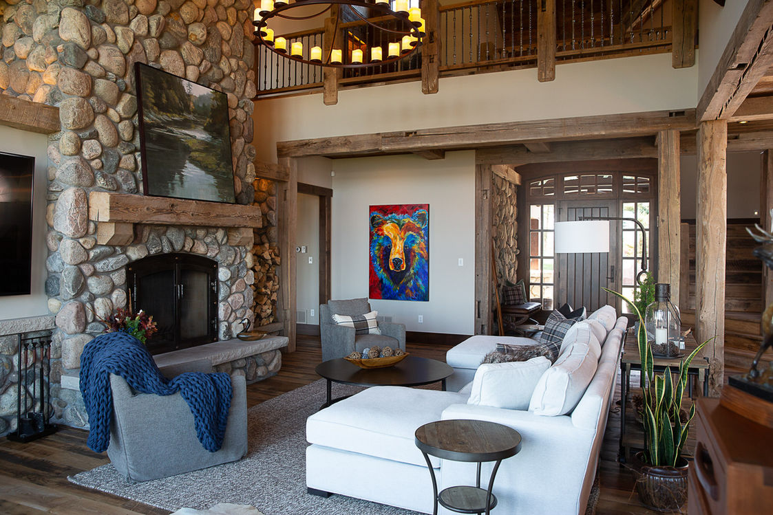 Stone fireplace and chandelier