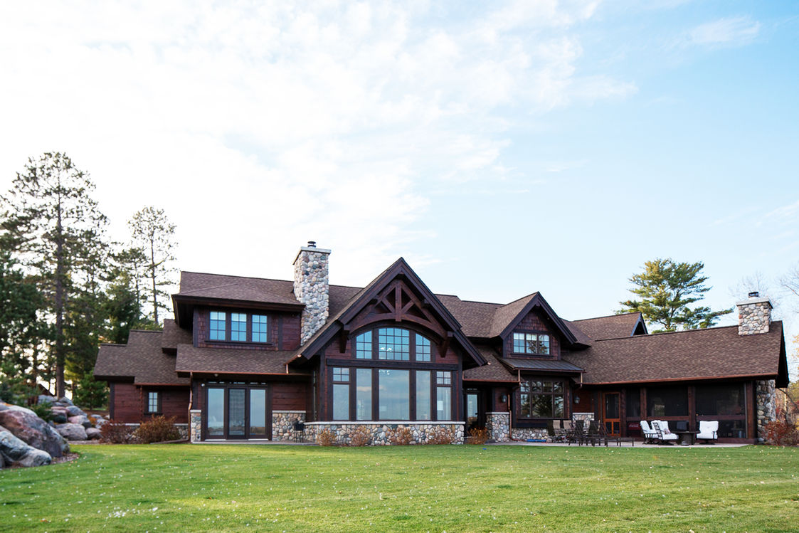 Back of brown lake home 