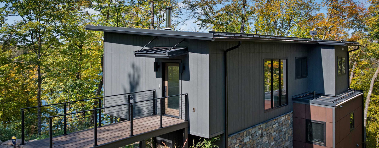 Modern home with catwalk entry to house