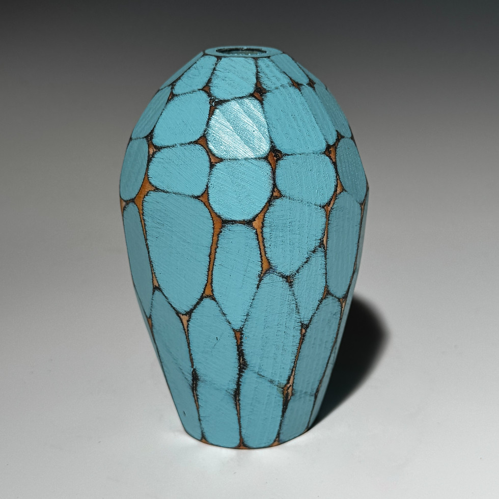 Thumbnail: Colorful wood bud vase holds water