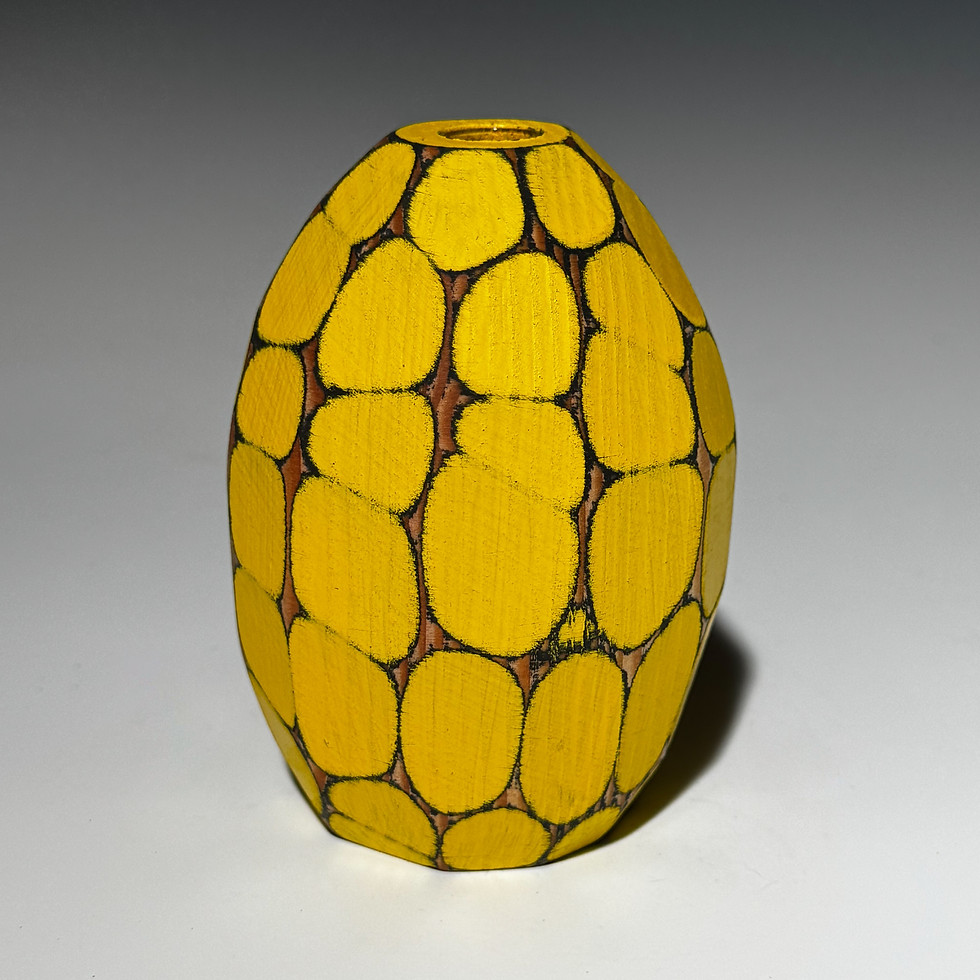 Thumbnail: Colorful wood bud vase holds water