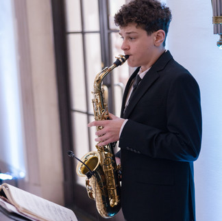 Saxophone player at Mellon Auditorium