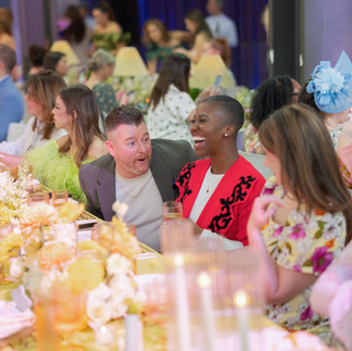 Guests chatting and laughing at erin go glam luncheon
