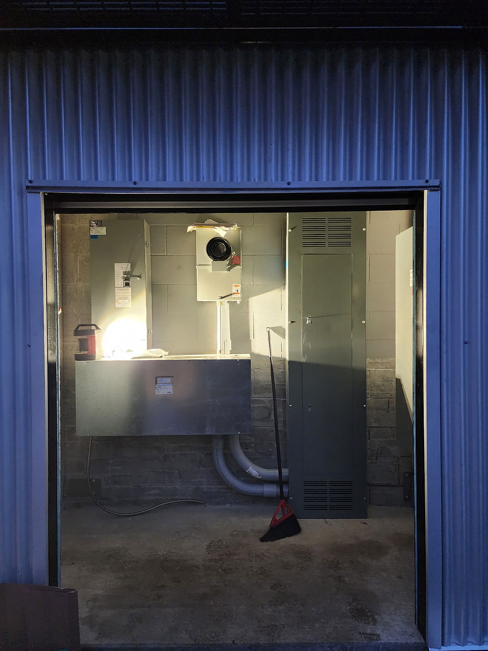 Electrician wiring commercial equipment in Duncan BC