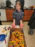 Student chopping vegetables