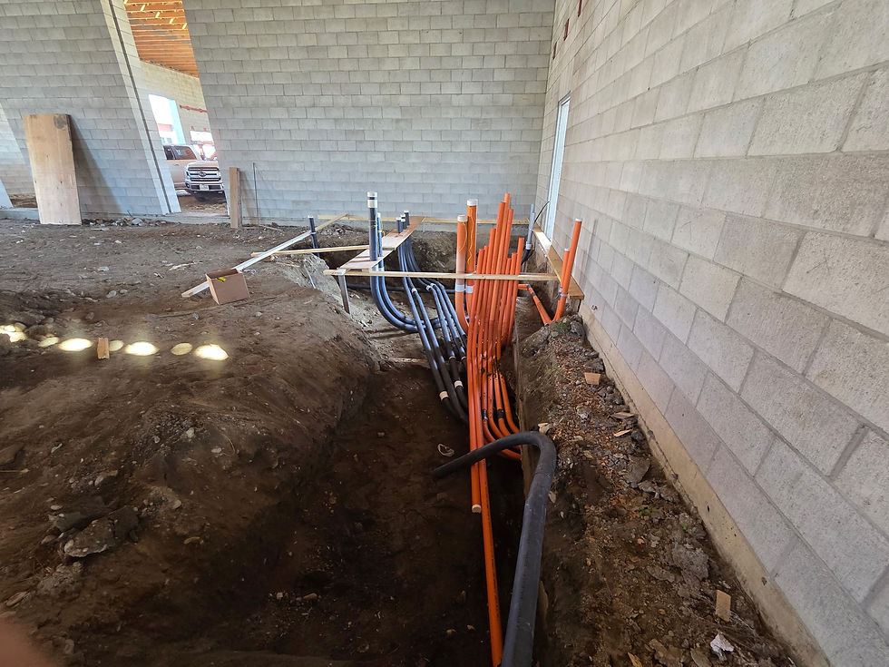 Commercial electrician installing electrical system in business space