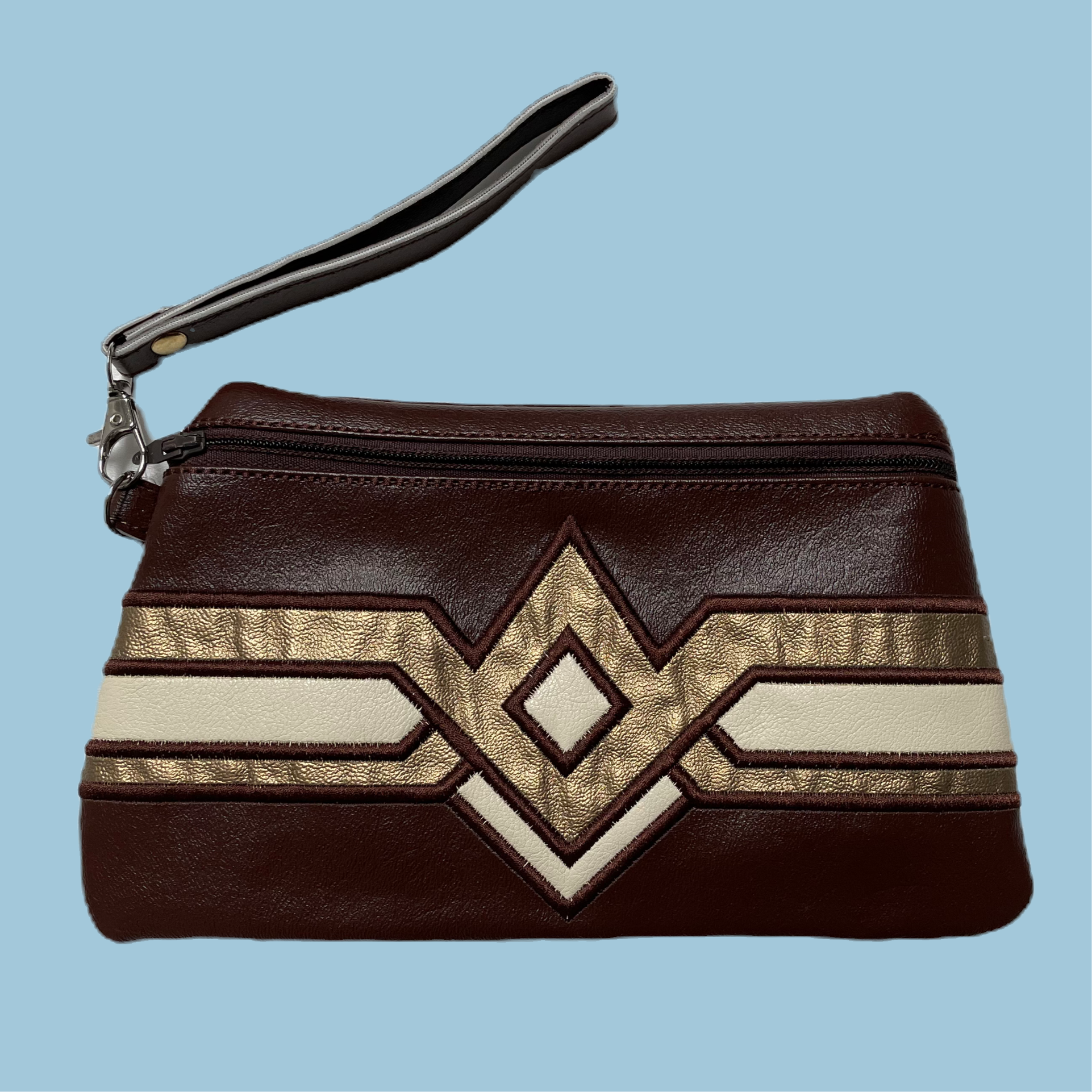 embroidered vinyl clutch with with stripe design