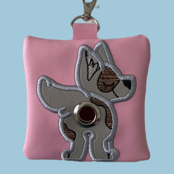 Cattle dog on a pink background