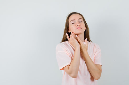 young-woman-pink-t-shirt-touching-skin-neck-chin-looking-fascinating.jpg
