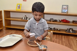 Chopping carrot sticks- food prep 