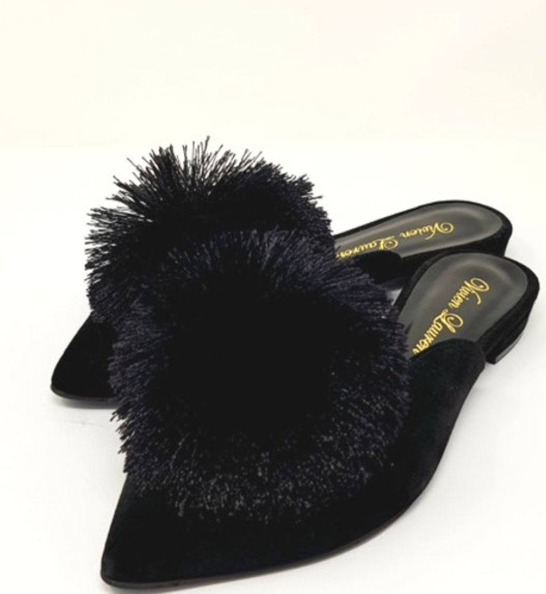The Luxury flat pom pom mule in Italian leather suede by Vivien Lauren