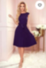 Model wearing classic pleated midi dress for business by Vivien Lauren 