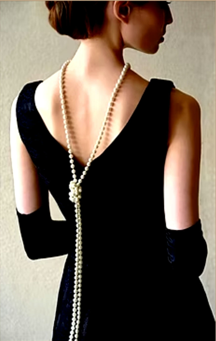Beautiful lady wearing The little black dress in velvet by Vivien Lauren