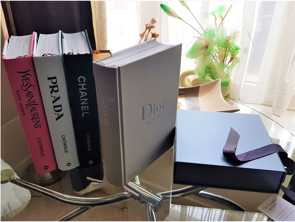 Designer Catwalk Books with more than 600 pages of cataloged looks and designs - on the Vivien Lauren Fashion Libray