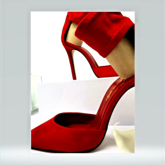 Red ankle strap heels by Vivien Lauren