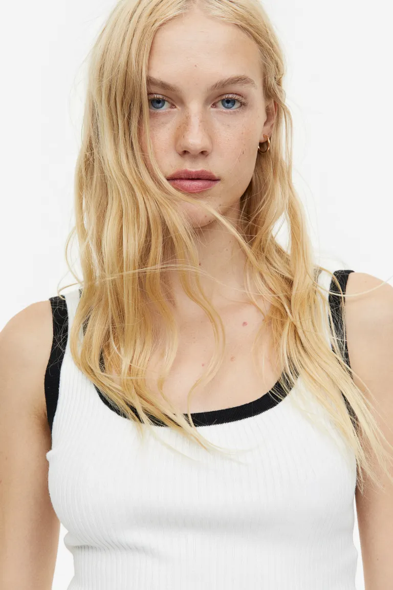 white top with black lining