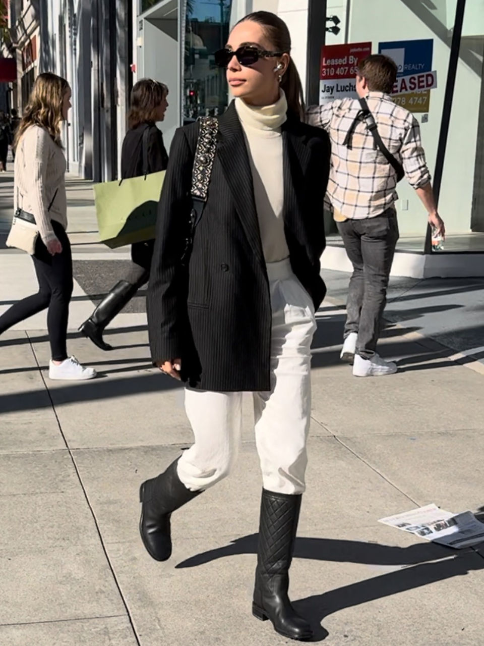 a women wearing high boots