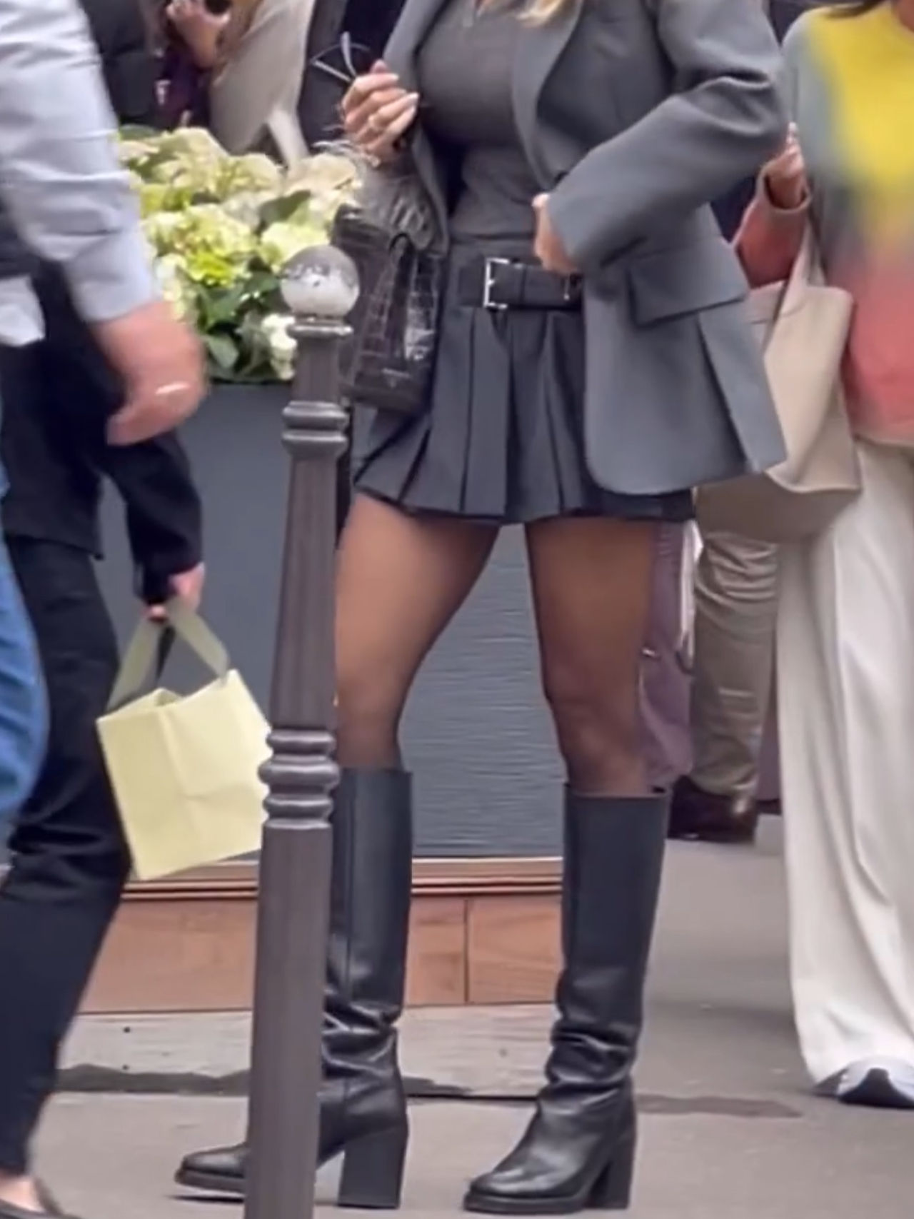 a women wearing high boots