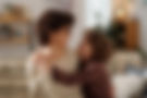 mom.with.glasses.hugging.son.jpg